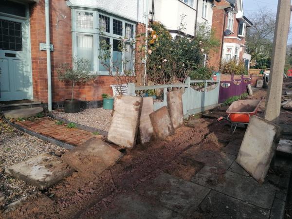 Major works have been undertaken on the pavement without any prior notification, and with absolutely no regard for private property: slabs have been leaned against timber fences, or across drives and on ornamental features.-25 Knighton Church Road, Leicester LE2 3JG, England, United Kingdom