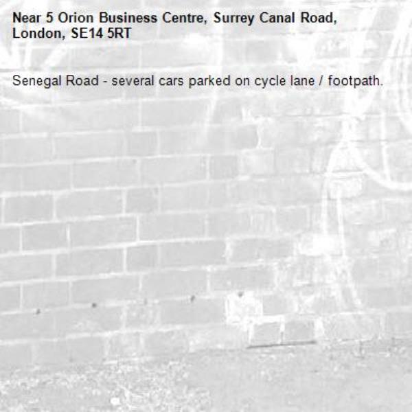 Senegal Road - several cars parked on cycle lane / footpath.-5 Orion Business Centre, Surrey Canal Road, London, SE14 5RT
