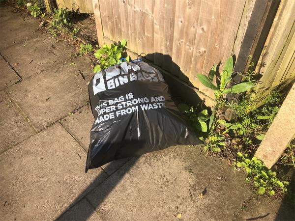 Please clear a dumped bag of waste-50 Glenbow Road, Bromley, BR1 4RL