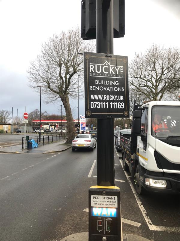 Junction of Chinbrook Road. Remove flypostering from traffic lights-Grove Park Pharmacy, Grove Park Pharmacy, 344 Baring Road, London, SE12 0DU