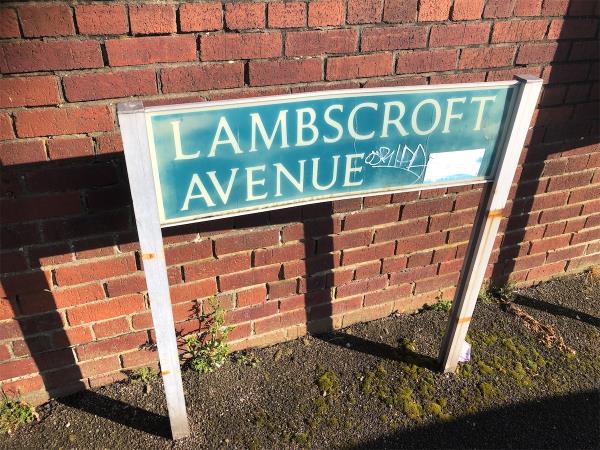 Remove graffiti from street sign adjacent To Estate Map-2 Lambscroft Avenue, Grove Park, London, SE9 4NZ