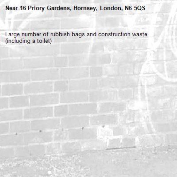 Large number of rubbish bags and construction waste (including a toilet)-16 Priory Gardens, Hornsey, London, N6 5QS