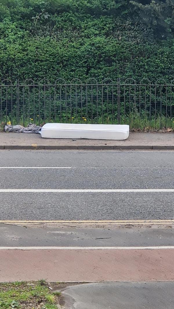 Fly - tipping appeared over night of a white mattress and a grey blanket near the BP petrol station next to the black allotment railings opposite house 51 groby road.  This is now blocking the foot path on that side-51 groby road le3 9ee
