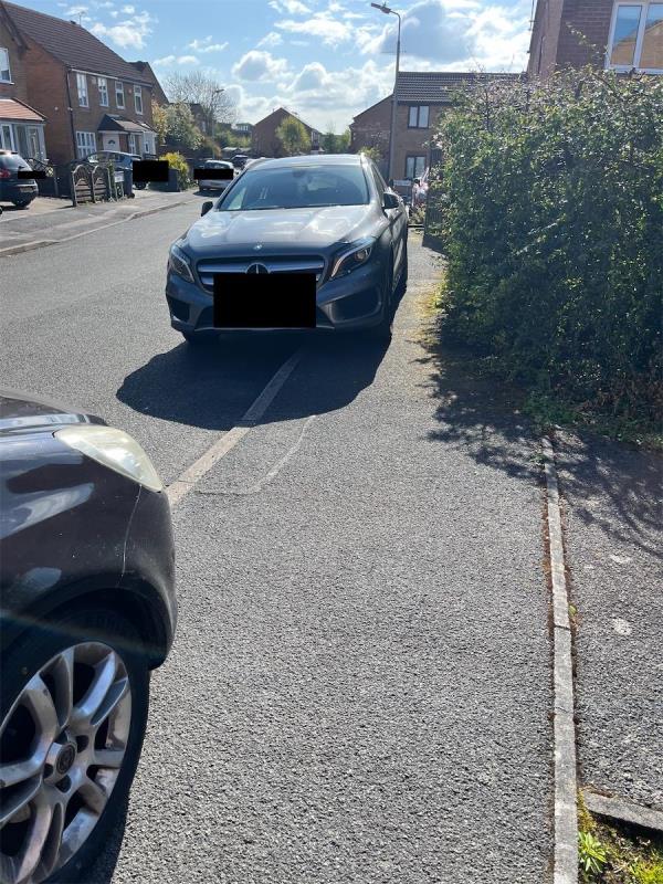 Cars blocking pavement where children are walking to school. Meadowsweet Rd & Cranesbill Rd -15 Cranesbill Road, Leicester, LE5 1TA