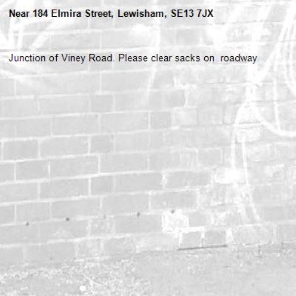 Junction of Viney Road. Please clear sacks on  roadway-184 Elmira Street, Lewisham, SE13 7JX