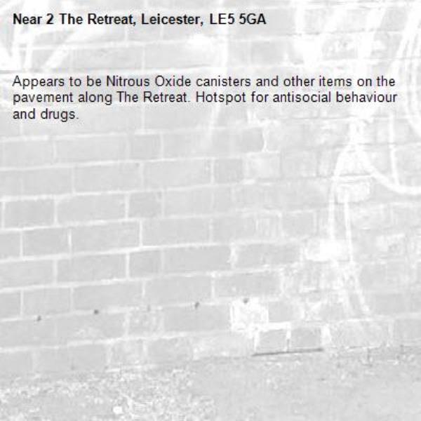 Appears to be Nitrous Oxide canisters and other items on the pavement along The Retreat. Hotspot for antisocial behaviour and drugs.-2 The Retreat, Leicester, LE5 5GA