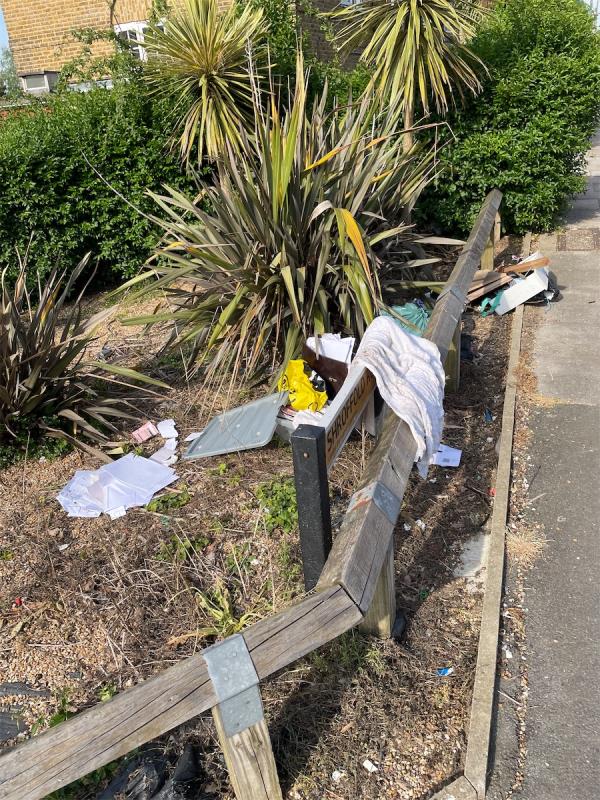 Lots of household rubbish dumped on verge, with bills, and address letters, please find attached the address on the letters. -233 Shroffold Road, Bromley, BR1 5JG