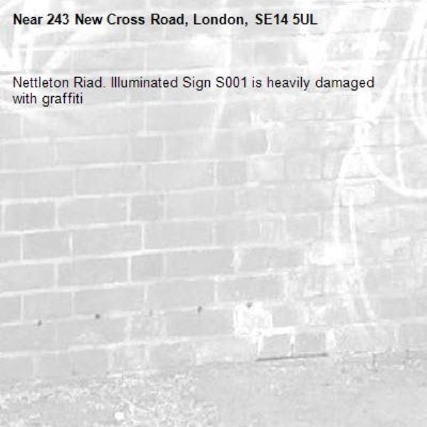 Nettleton Riad. Illuminated Sign S001 is heavily damaged with graffiti-243 New Cross Road, London, SE14 5UL