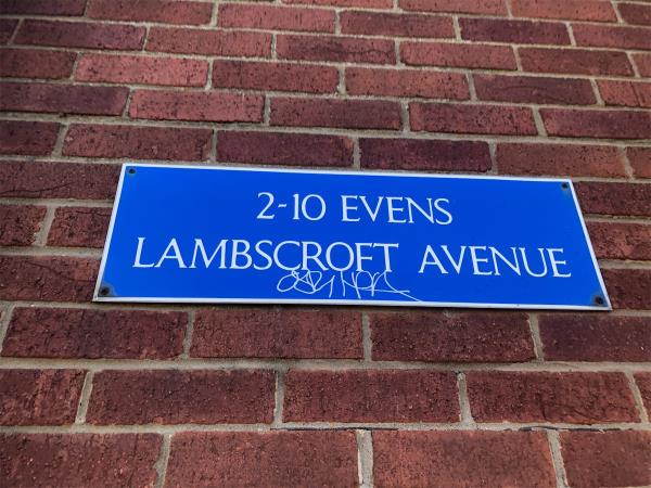 2-10. Remove graffiti from block sign-2 Lambscroft Avenue, Grove Park, London, SE9 4NZ