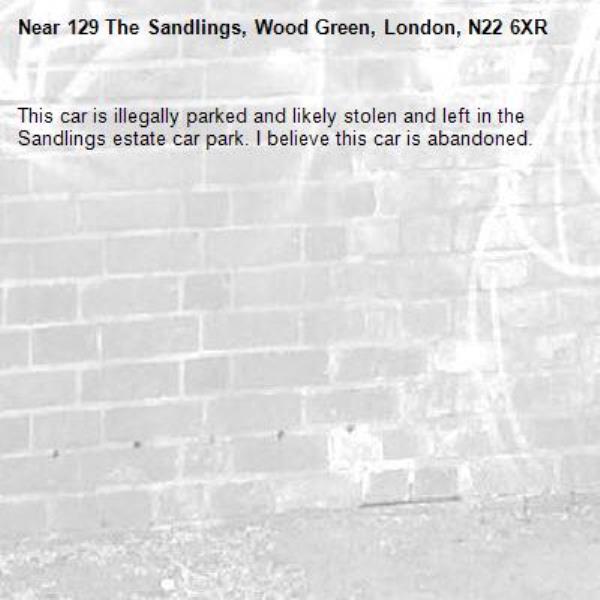 This car is illegally parked and likely stolen and left in the Sandlings estate car park. I believe this car is abandoned.-129 The Sandlings, Wood Green, London, N22 6XR