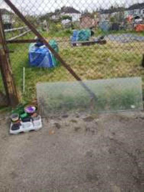 Outside Entrance to Allotments
Please clear a paint pot and a pain of Glass
-45 Hazelbank Road, London, SE6 1LR