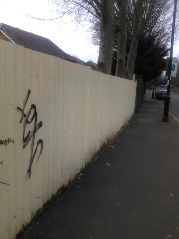 graffiti on cream coloured fence on Lewisham Hill near Blackheath Rise.  The graffiti is on both ends of the fence.-49 Blackheath Rise, Lewisham, SE13 7PN