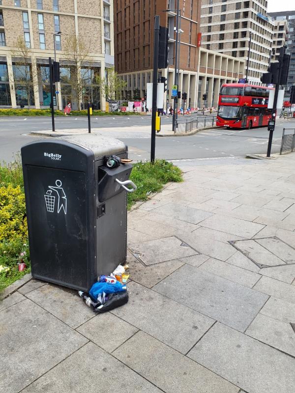 Outside station bin needs emptying -Barking Road, Canning Town, London