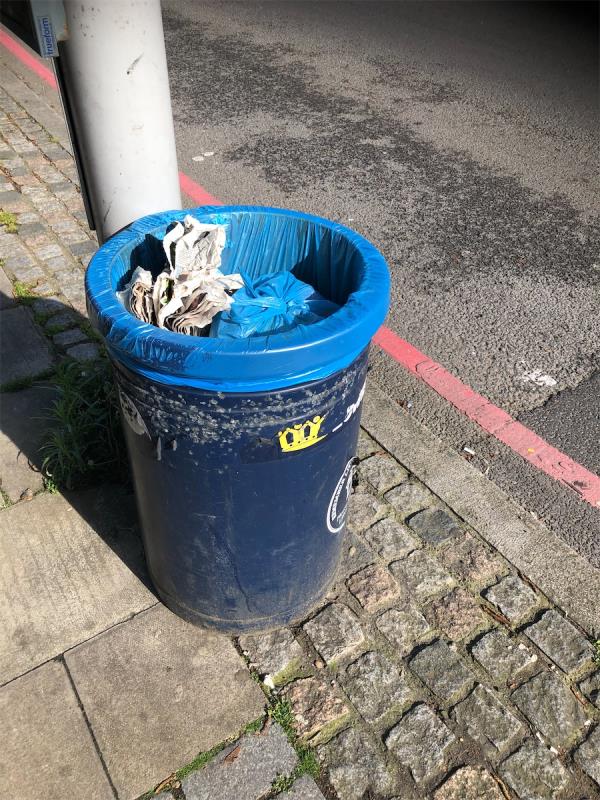 Please empty litter bin by bus stop-Cade Tyler House, Blackheath Hill, Greenwich, SE10 8TG