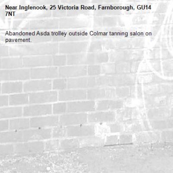 Abandoned Asda trolley outside Colmar tanning salon on pavement.-Inglenook, 25 Victoria Road, Farnborough, GU14 7NT