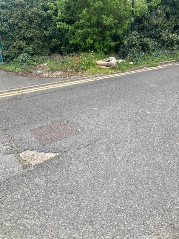 Flytipping on grass-88 Downings, Beckton, London, E6 6WW