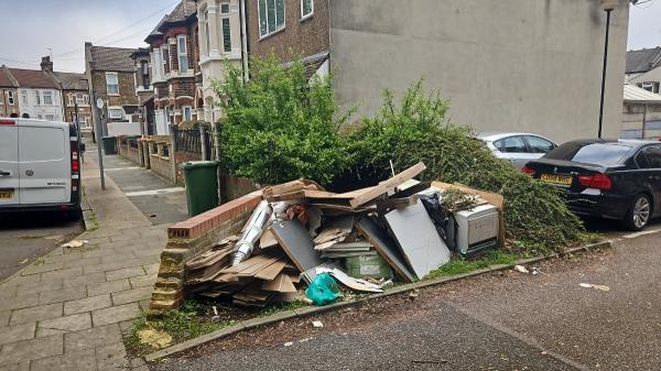 Ever growing pile of refurbishment rubbish. It would be good to have a camera there. Maybe worth checking with the residents if they have any footage. The pile keeps growing.-4 Holland Road, Stratford, London, E15 3BP