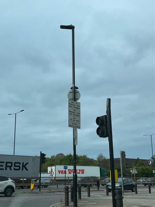 Street sign attached to lamp column is facing the wrong way and needs to have its orientation adjusted on Teignmouth Gardens junction Bideford Avenue Ub6 -2c Teignmouth Gardens, Perivale, UB6 8BX, England, United Kingdom