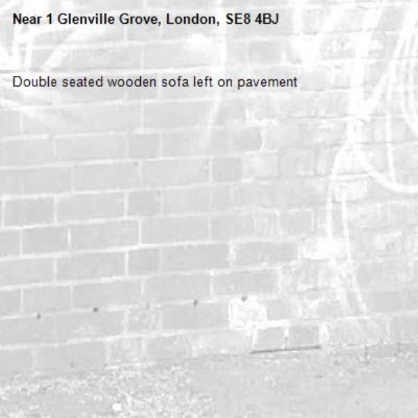 Double seated wooden sofa left on pavement -1 Glenville Grove, London, SE8 4BJ
