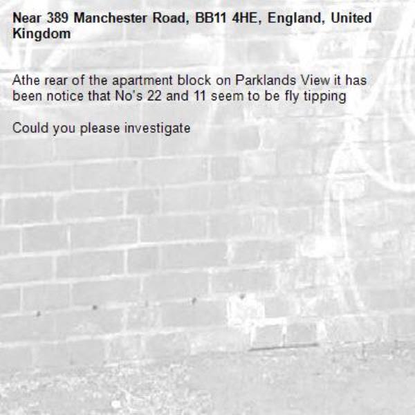 Athe rear of the apartment block on Parklands View it has been notice that No's 22 and 11 seem to be fly tipping-389 Manchester Road, BB11 4HE, England, United Kingdom