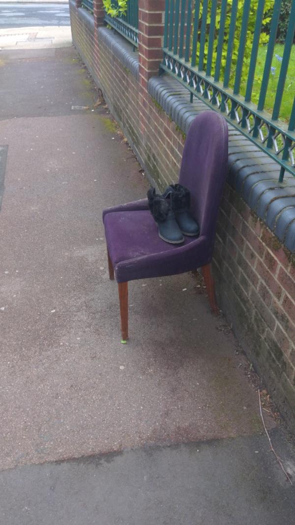 Chair dumped between 1 Mafeking Ave and Barking Rd -1 Mafeking Avenue, East Ham, London, E6 3BQ