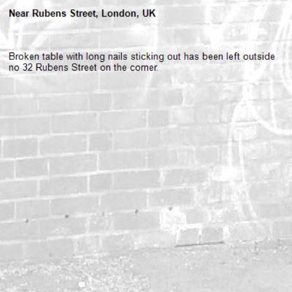 Broken table with long nails sticking out has been left outside no 32 Rubens Street on the corner.-Rubens Street, London, UK