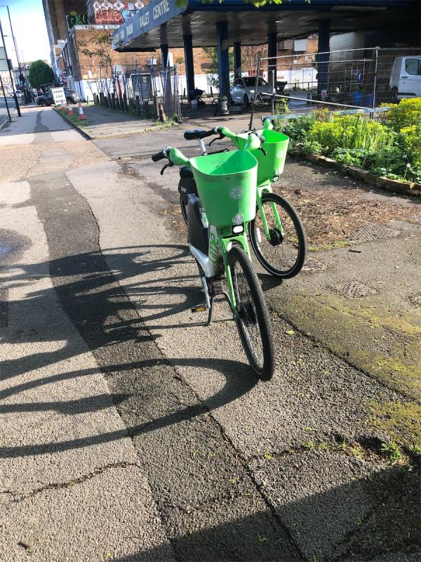 Outside Hand Car wash. Please clear  two Abandoned Lime bikes-37 Burnt Ash Road, London, SE12 8RF