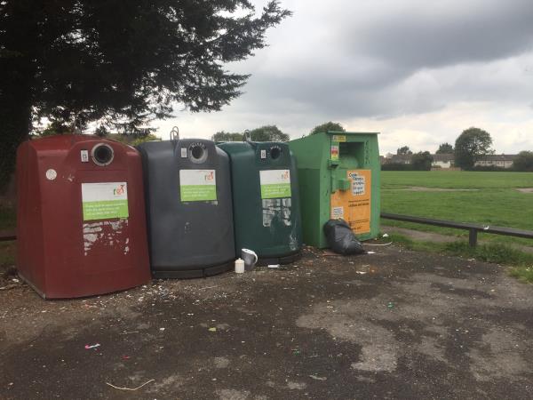 Extra items left at the recycling bins in the Church End Lane car park at Meadway Rec-10 The Meadway, Churchend, RG30 4PL