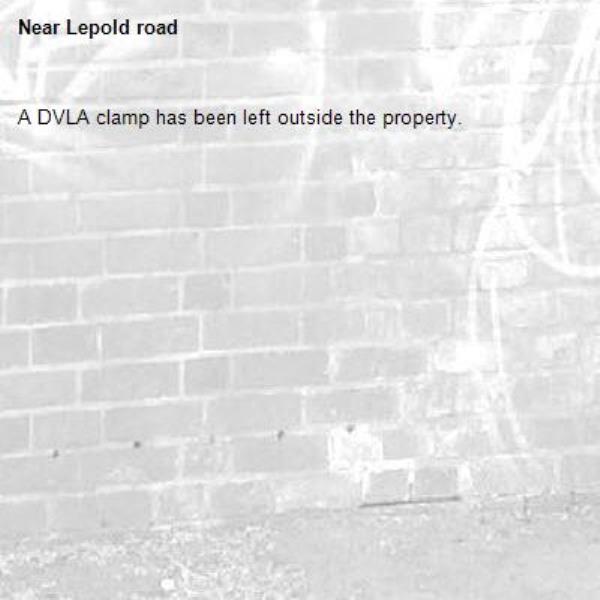 A DVLA clamp has been left outside the property.-Lepold road