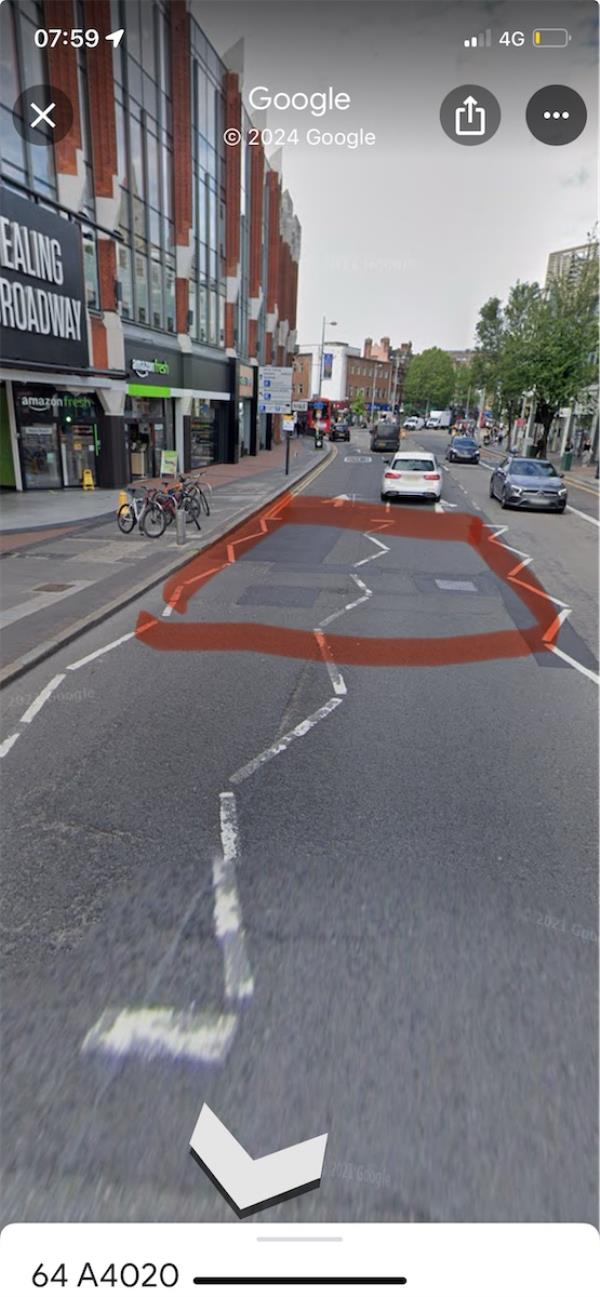 Many potholes are located on The Broadway opposite Curious Roo -57 The Broadway, Ealing, W5 5JN
