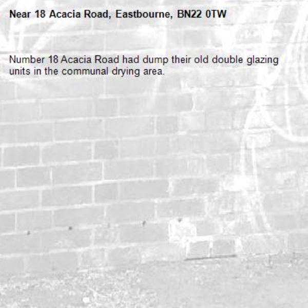 Number 18 Acacia Road had dump their old double glazing units in the communal drying area. -18 Acacia Road, Eastbourne, BN22 0TW