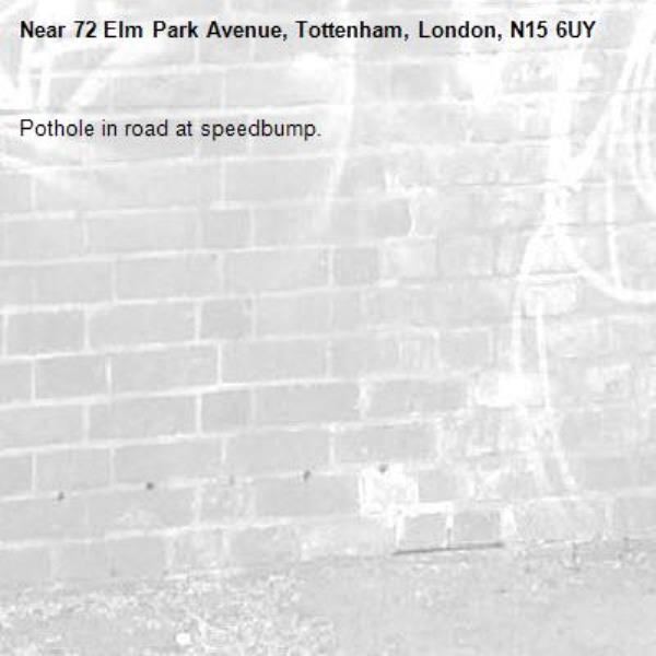 Pothole in road at speedbump.-72 Elm Park Avenue, Tottenham, London, N15 6UY