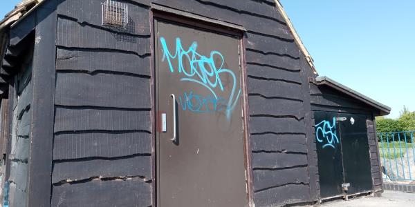 Graffiti on the walls and doors of the swimming pool building removed -Christchurch Meadows Toilets, Wolsey Road, Caversham, Reading, RG4 8DH