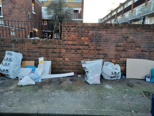 Bags of household waste and one bag of industrial waste and bags of building material -38 Carolina Close, Stratford, E15 1JR, England, United Kingdom
