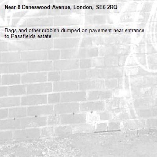 Bags and other rubbish dumped on pavement near entrance to Passfields estate-8 Daneswood Avenue, London, SE6 2RQ