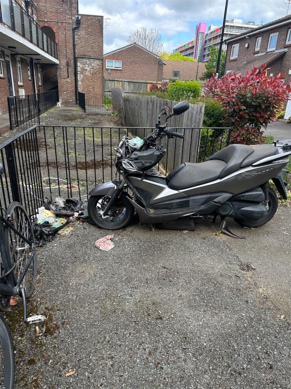 Motorbike and tyres abandoned here-26 Vaughan Williams Close, London, SE8 4AW