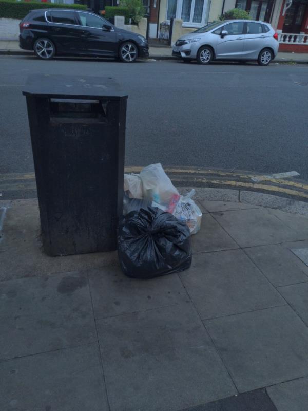 Rubbish bags dumped outside laundrette on the corner of Mafeking Ave and Central Park road, reported as removed but still here.-147a Central Park Road, East Ham, E6 3DJ
