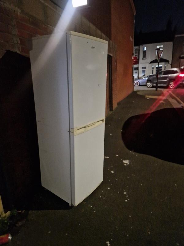 Fridge freezer and crate dumped on pavement -65 Cromwell Road, Forest Gate, London, E7 8PA