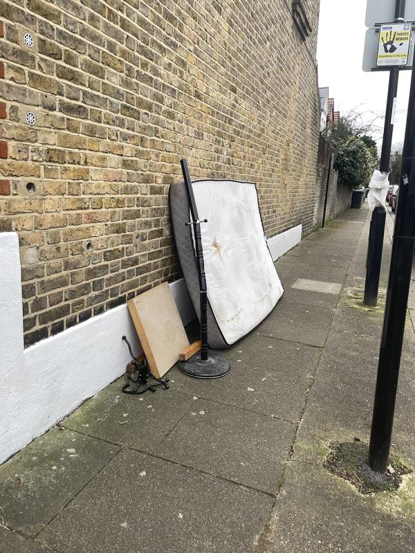 Mattress and other debris left on the corner of Overcliff Road and Shell Road.-52B Shell Rd, London SE13 7TY, UK