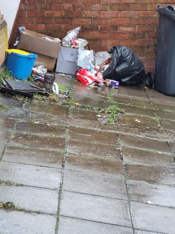 Bin collection not taken rubbish...this bag was on the bin (overflowing) so they've not taken....links again with previous two reports-3 Merton Avenue, Leicester, LE3 6BF