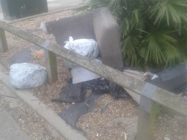 Junction of Downham Way. Please clear a chair from grass area-1 Glenbow Road, Bromley, BR1 4RN
