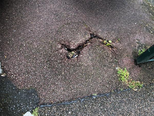 126.148’. Please repair damage to Estate Footpath at side off Entrance to parking area-126 Lewisham Road, Ladywell, London, SE13 7NH