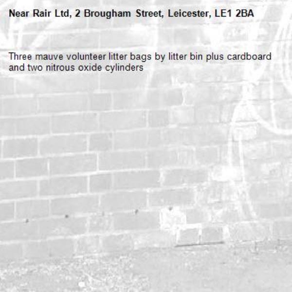 Three mauve volunteer litter bags by litter bin plus cardboard and two nitrous oxide cylinders -Rair Ltd, 2 Brougham Street, Leicester, LE1 2BA