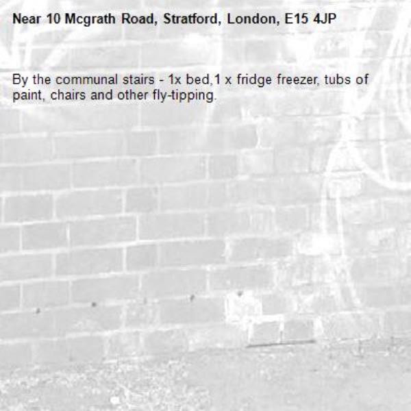 By the communal stairs - 1x bed,1 x fridge freezer, tubs of paint, chairs and other fly-tipping.-10 Mcgrath Road, Stratford, London, E15 4JP