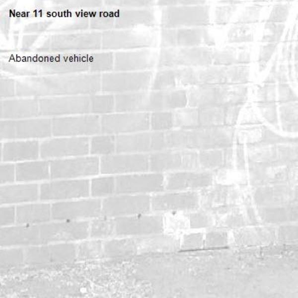 Abandoned vehicle-11 south view road 