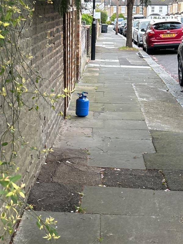Some sort of metal cylinder now dumped on pavement. -57A, Fairlawn Park, London, SE26 5SA