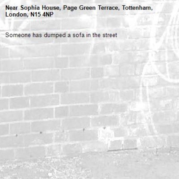 Someone has dumped a sofa in the street-Sophia House, Page Green Terrace, Tottenham, London, N15 4NP