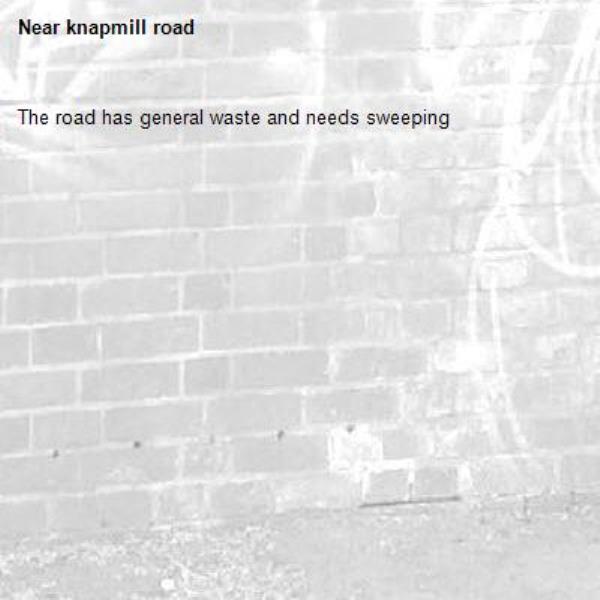 The road has general waste and needs sweeping -knapmill road