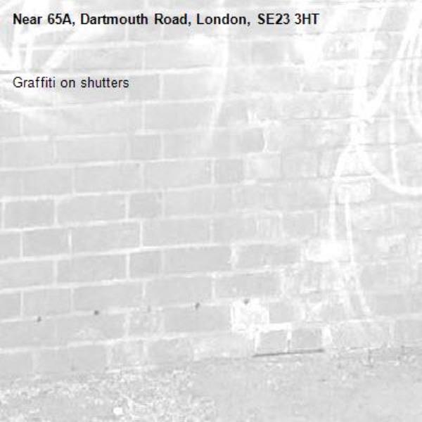 Graffiti on shutters -65A, Dartmouth Road, London, SE23 3HT