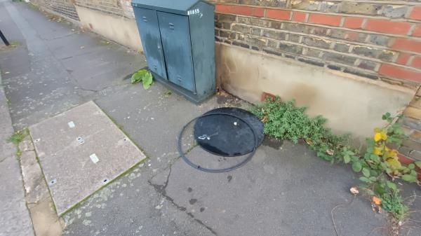 Metal table top left on pavement next to telecom cabinet on York Road, to right of 47 York Road-47 York Road, Forest Gate, London, E7 9HT